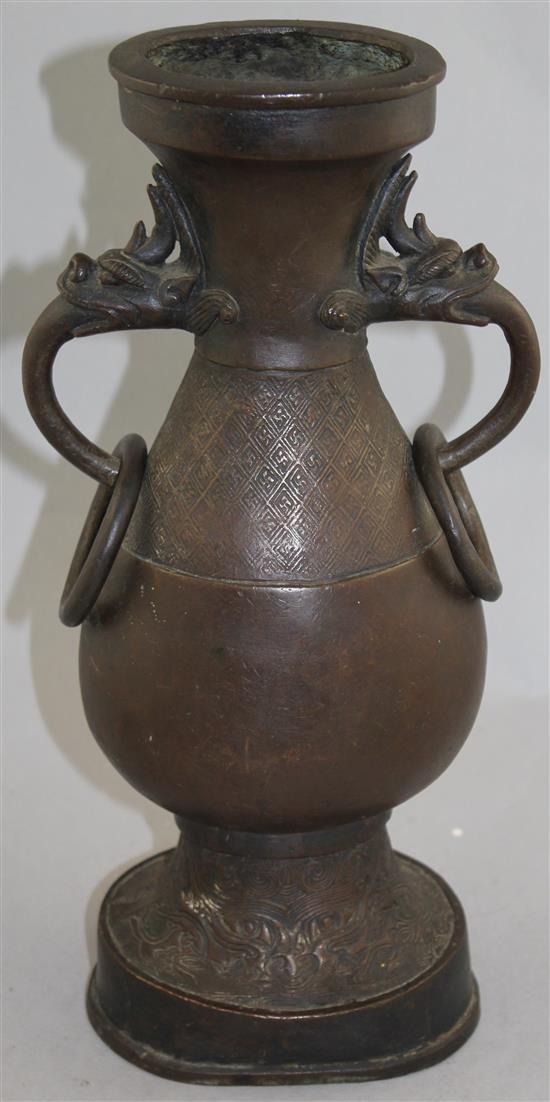 A large Chinese bronze hu vase, Yuan Dynasty, 38.5cm, foot mis-shapen